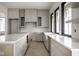 Beautiful kitchen featuring light gray cabinets and a large island provides both style and functionality at 19909 Windsor Park Blvd, Westfield, IN 46069