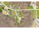 An aerial view shows the house nestled within its suburban neighborhood at 2072 S Rembrandt Cv, Martinsville, IN 46151
