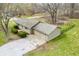 Overhead shot showcasing the home's curb appeal, fenced yard, and attached garage at 2072 S Rembrandt Cv, Martinsville, IN 46151