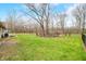 A spacious backyard features a well-maintained lawn and fenced perimeter at 2072 S Rembrandt Cv, Martinsville, IN 46151