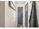 Inviting foyer with laminate flooring, coat hooks, and a view into other living spaces at 2072 S Rembrandt Cv, Martinsville, IN 46151