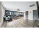 Large living room with a ceiling fan, vinyl floors and lots of natural light at 2072 S Rembrandt Cv, Martinsville, IN 46151