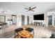 Open concept living and dining area with vinyl floors and lots of natural light at 2072 S Rembrandt Cv, Martinsville, IN 46151