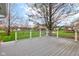 Expansive back deck with white railings and gray stained surface, perfect for outdoor enjoyment at 222 Wellington Pkwy, Noblesville, IN 46060