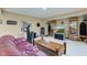 Spacious finished basement with a comfortable seating area, exercise equipment, and plenty of room for activities at 222 Wellington Pkwy, Noblesville, IN 46060