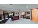 Finished basement with entertainment and exercise areas, with a plush sofa and classic pool table at 222 Wellington Pkwy, Noblesville, IN 46060