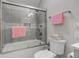 Bright bathroom features a glass enclosed shower and toilet with a basket of toilet paper at 222 Wellington Pkwy, Noblesville, IN 46060