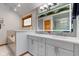Updated bathroom featuring a step in shower, bathtub, double sink vanity, and plenty of storage space at 222 Wellington Pkwy, Noblesville, IN 46060
