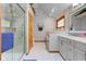 Beautiful bathroom featuring a step in shower, bathtub, and updated cabinets at 222 Wellington Pkwy, Noblesville, IN 46060