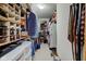 Spacious walk-in closet with ample storage, including shelving and hanging space for clothes and accessories at 222 Wellington Pkwy, Noblesville, IN 46060