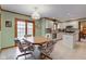 Dining area with wooden table and chairs is adjacent to the kitchen in this home at 222 Wellington Pkwy, Noblesville, IN 46060