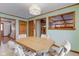 View of dining area showcasing wood trim and view into neighboring rooms at 222 Wellington Pkwy, Noblesville, IN 46060