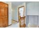 Upstairs hallway that showcases wood doors and trim at 222 Wellington Pkwy, Noblesville, IN 46060