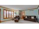Comfortable living room with large bay window, cozy seating, and light blue walls at 222 Wellington Pkwy, Noblesville, IN 46060
