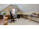 Cozy attic office space with natural light and ample workspace at 222 Wellington Pkwy, Noblesville, IN 46060