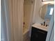 Clean bathroom featuring shower with tub, modern vanity, and updated fixtures at 2249 Grand Fir Dr, Greenwood, IN 46143
