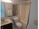 A bathroom featuring a shower and tub combo with a sink and updated flooring at 2249 Grand Fir Dr, Greenwood, IN 46143