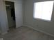 Bedroom with hardwood floors, a closet, neutral paint and sunny window at 2249 Grand Fir Dr, Greenwood, IN 46143