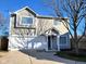 Charming two-story home with a well-maintained lawn, attached garage and concrete driveway at 2249 Grand Fir Dr, Greenwood, IN 46143