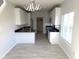 Stylish kitchen featuring granite countertops, stainless steel appliances and ample storage at 2249 Grand Fir Dr, Greenwood, IN 46143