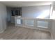 Open loft area with lots of natural light, neutral paint, and hardwood floors at 2249 Grand Fir Dr, Greenwood, IN 46143