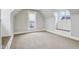 Attic space is carpeted and features wall trim and a small bench seating area at 234 S State Ave, Indianapolis, IN 46201