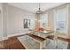 Dining area with natural light, table and chairs, bench, and views of the surrounding landscape at 234 S State Ave, Indianapolis, IN 46201
