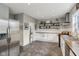 Spacious kitchen features stainless steel appliances, wood countertops, and decorative shelving at 234 S State Ave, Indianapolis, IN 46201