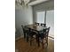 Cozy dining area features a wood table with comfortable seating and bright natural light, perfect for Gathering meals at 2509 Bristlecone Dr, Indianapolis, IN 46217