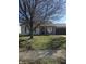 Lovely single-story home with an attached garage and manicured lawn, creating a welcoming and comfortable atmosphere at 2509 Bristlecone Dr, Indianapolis, IN 46217