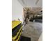Attached garage with storage and parked car at 2509 Bristlecone Dr, Indianapolis, IN 46217