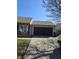 Attached garage with ample driveway space, offering convenient parking and storage solutions for homeowners at 2509 Bristlecone Dr, Indianapolis, IN 46217