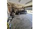 Attached garage with storage and parked car at 2509 Bristlecone Dr, Indianapolis, IN 46217