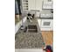 The kitchen features granite countertops, modern appliances, and ample cabinet space at 2509 Bristlecone Dr, Indianapolis, IN 46217