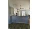 Well-lit kitchen features an open layout, granite countertops, modern appliances, and a cozy dining area at 2509 Bristlecone Dr, Indianapolis, IN 46217