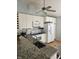 Bright kitchen features granite countertops, modern white appliances, and ample cabinet space for storage and organization at 2509 Bristlecone Dr, Indianapolis, IN 46217