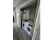 A small laundry area with newer front-load washer and dryer units at 2509 Bristlecone Dr, Indianapolis, IN 46217