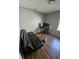 Living room with hardwood floors, a desk, and natural light at 2509 Bristlecone Dr, Indianapolis, IN 46217