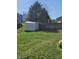 Spacious backyard with a storage shed to keep gardening tools and equipment organized at 2509 Bristlecone Dr, Indianapolis, IN 46217