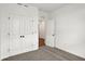 Bright bedroom featuring neutral carpet, white walls, and a double-door closet for ample storage at 260 Onset Way, Westfield, IN 46074