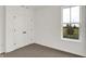 Spare bedroom with carpet floors, white trim, and double-door closet at 260 Onset Way, Westfield, IN 46074