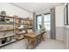 Bright office space with a wooden desk, shelving, and a large window with great natural light at 260 Onset Way, Westfield, IN 46074