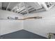 Unfinished basement with painted floor and walls, perfect for storage and features new drywall at 2920 E 11Th St, Indianapolis, IN 46201