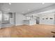 Bright, open-concept living area with hardwood floors, recessed lighting, and a seamless flow to the kitchen at 2920 E 11Th St, Indianapolis, IN 46201