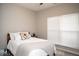 Bedroom with queen size bed, neutral colors and natural light at 3168 Lodgepole Dr, Whiteland, IN 46184
