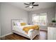 Bright bedroom with a queen-sized bed and a large window at 3168 Lodgepole Dr, Whiteland, IN 46184