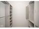 Walk-in closet with custom shelving and ample storage space at 3168 Lodgepole Dr, Whiteland, IN 46184