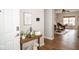 Welcoming foyer with views into the home's living space, beautiful floors, and natural light at 3168 Lodgepole Dr, Whiteland, IN 46184