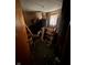 Messy bedroom with boxes and miscellaneous items scattered throughout the room at 326 N Grant St, Brownsburg, IN 46112