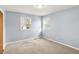 Empty bedroom featuring two windows that let in lots of natural light and neutral carpet at 333 E Waterbury Rd, Indianapolis, IN 46227
